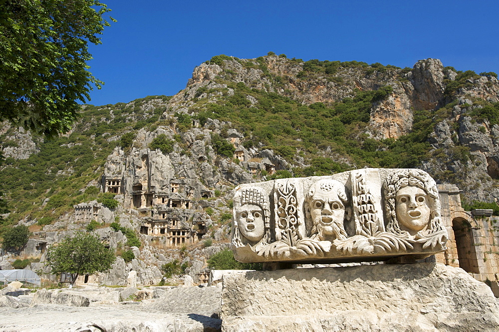 Lycian rock tombs and theater masks in Myra, Lycia, southern coast of Turkey, Turkey, Western Asia