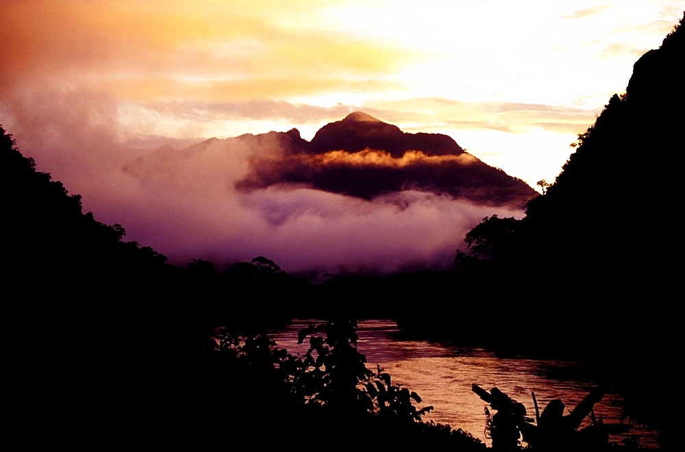 Misty mountains and river in the early morning, northern Laos, Asia