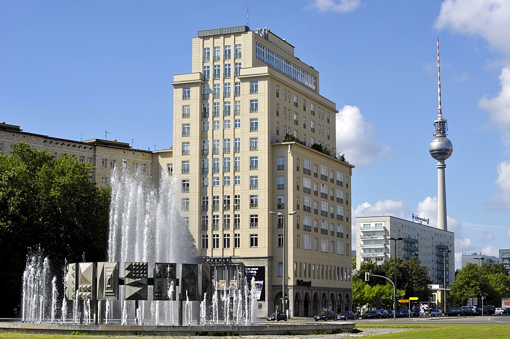 Fountain and high-rise building on Strausberger Platz square, TV tower, Berlin, Germany, Europe