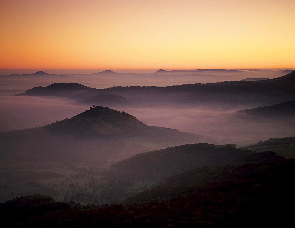 View from Breitenstein mountain across Limburg castle towards the three Kaiser mountains, near Weilheim, Swabian Alb, Germany, Europe