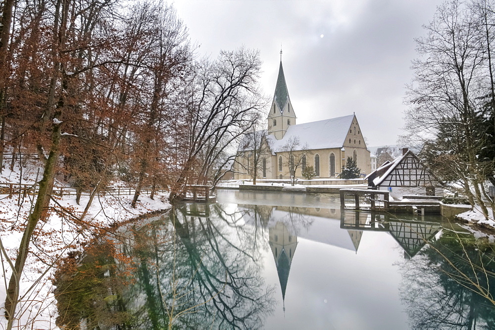 Monastery church reflected in the Blautopf spring, Kloster Blaubeuren monastery, Blaubeuren, Swabian Alb, Baden-Wuerttemberg, Germany, Europe