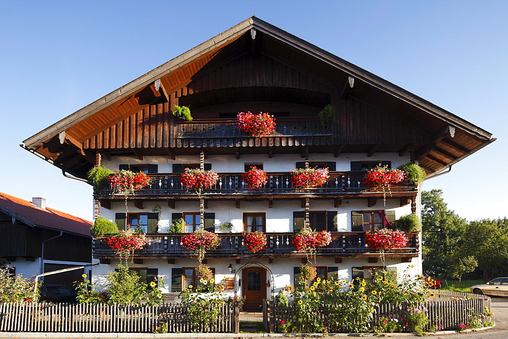 Farmhouse with geraniums on the balconies, Gaissach, Isarwinkel, Upper Bavaria, Bavaria, Germany, Europe