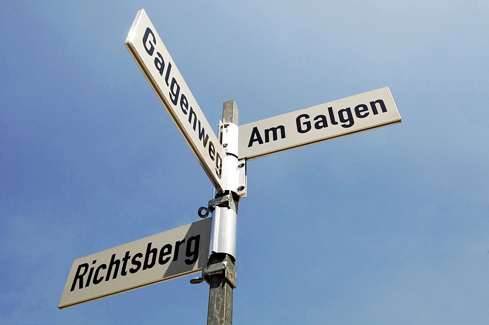 Street signs bearing the words Am Galgen, Galgenweg and Richtsberg at an exhibition in front of the Neanderthal Museum in Mettmann, North Rhine-Westphalia, Germany, Europe