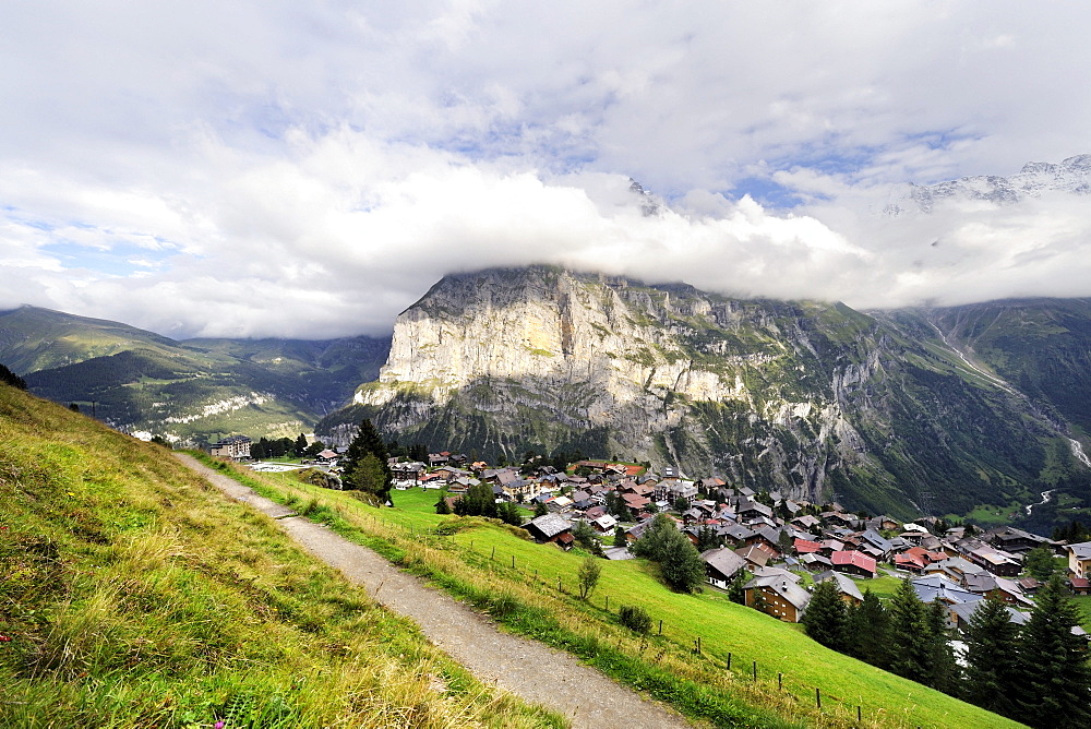 View of the traditional car-free Walser mountain village of Muerren above the Lauterbrunnen Valley and opposite of Staldenfluh Mountain, Canton of Bern, Switzerland, Europe