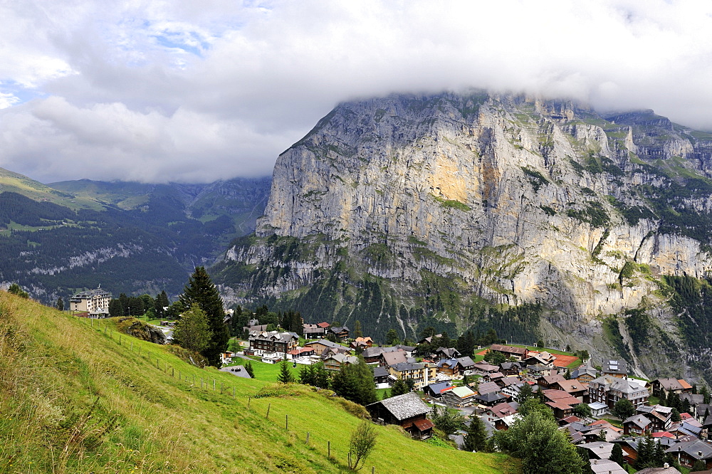 View of the traditional car-free Walser mountain village of Muerren above the Lauterbrunnen Valley and opposite of Staldenfluh Mountain, Canton of Bern, Switzerland, Europe