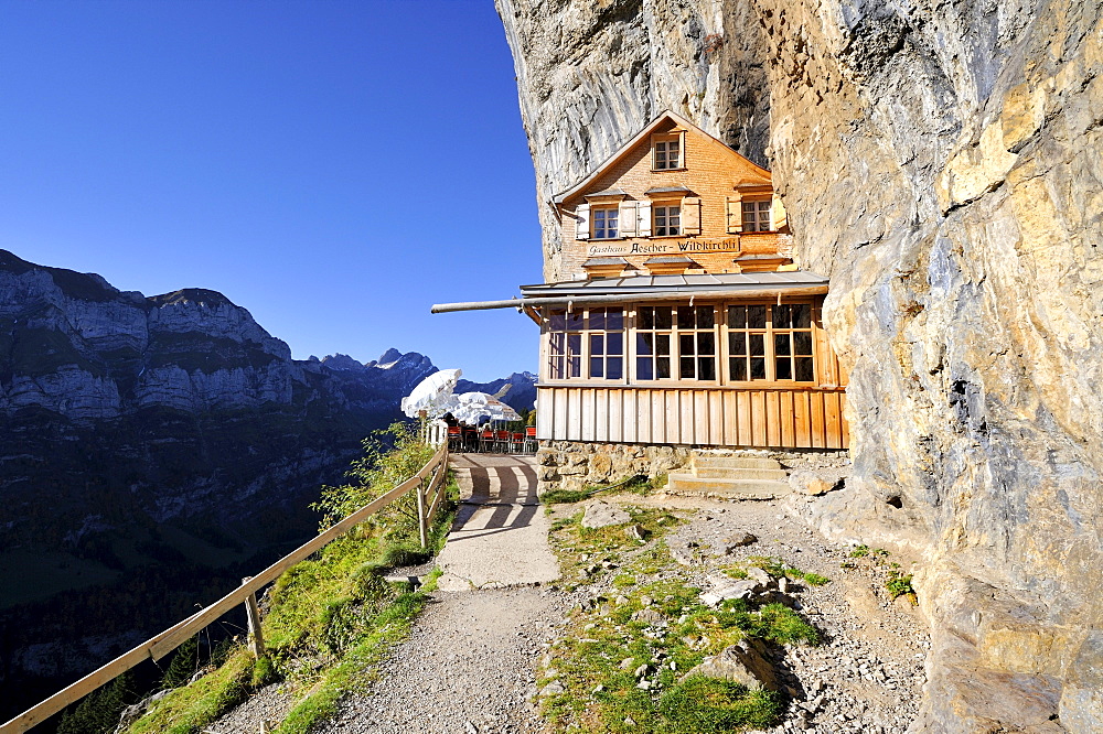 The Aescher mountain restaurant near the Wildkirchli caves below the Ebenalp cliff, Canton Appenzell Inner Rhodes, Switzerland, Europe