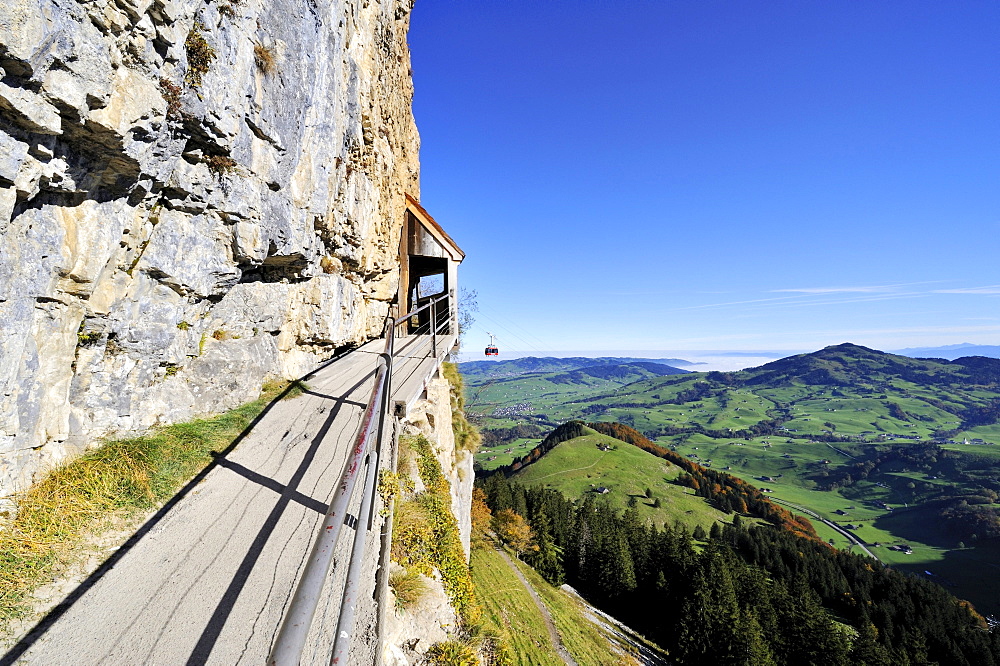 Safe trail path along the cliff of the Ebenalp between the Wildkirchli caves and Aescher mountain restaurant, Canton Appenzell-Innerrhoden, Switzerland, Europe