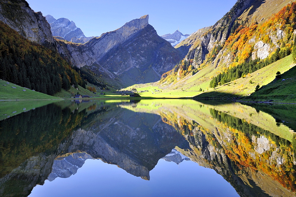 View from Seealp Lake, at 1143 m altitude, over the Seealp Mountains in autumn towards Rossmad Mountain, 2103 meters high, right behind, Saentis Mountain, to the left, Altmann Mountain, Canton of Appenzell Inner-Rhodes, Switzerland, Europe