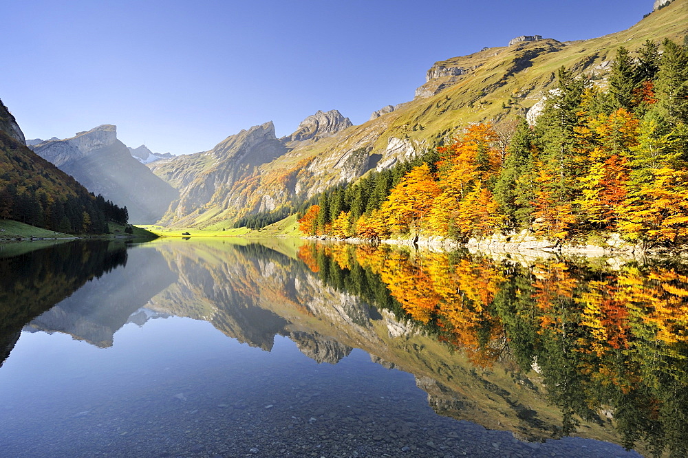 View from Seealp Lake, at 1143 m altitude, over the Seealp Mountains in autumn towards Rossmad Mountain, 2103 meters high, right behind, Saentis Mountain, Canton of Appenzell Inner-Rhodes, Switzerland, Europe