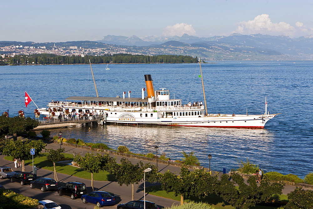 An old paddle-steamer as a ferry for tourists docked near Morges, canton of Vaud, Switzerland, Europe