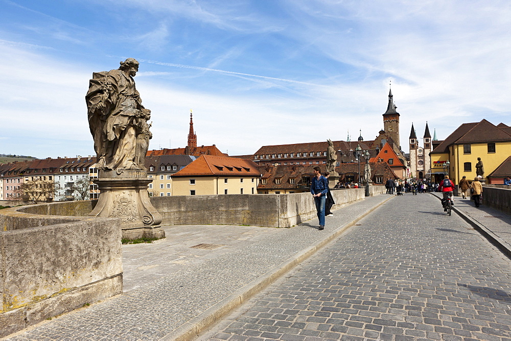 Alte Mainbruecke Main river bridge, overlooking the city hall and the Cathedral of St. Kilian, Wuerzburg, Bavaria, Germany, Europe