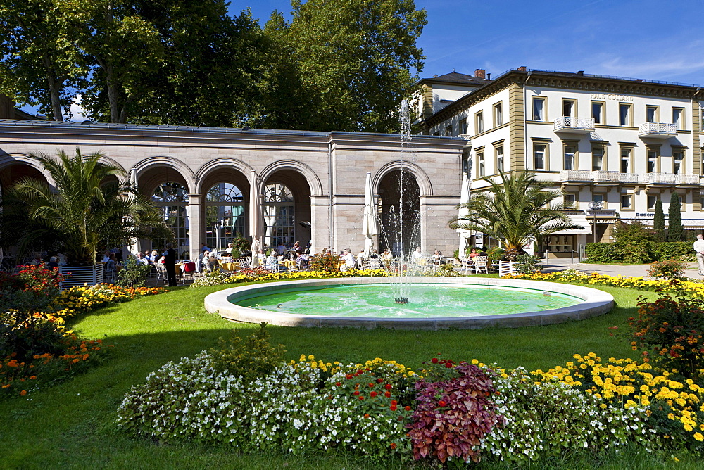 Pensioners in the Kurgarten Cafe, a cafe in a spa garden of the Kurhaus spa hotel with the Regentenbau building and arcade halls, Bad Kissingen, Lower Franconia, Bavaria, Germany, Europe