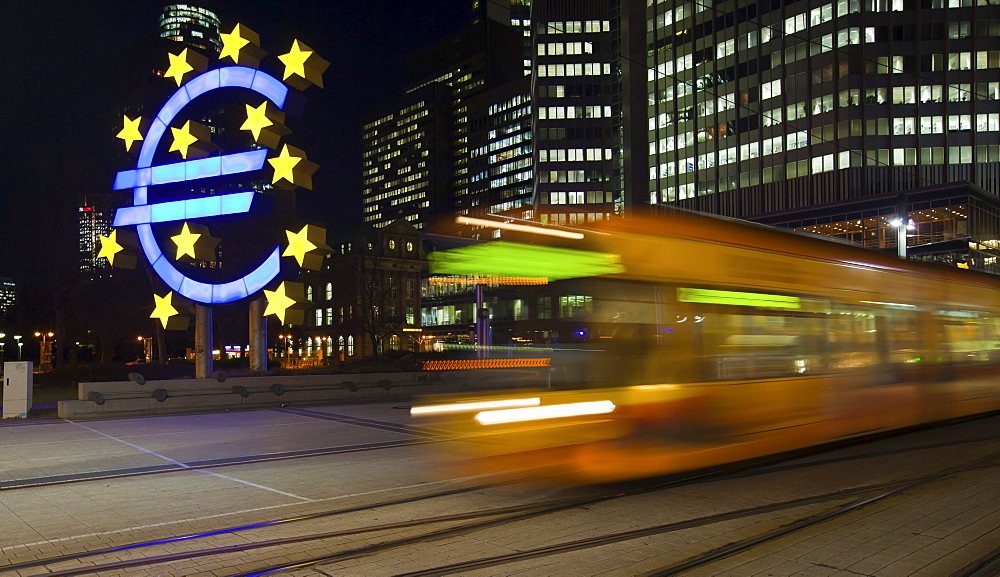 Tram passing the euro sign in front of the ECB, European Central Bank, Frankfurt am Main, Hesse, Germany, Europe