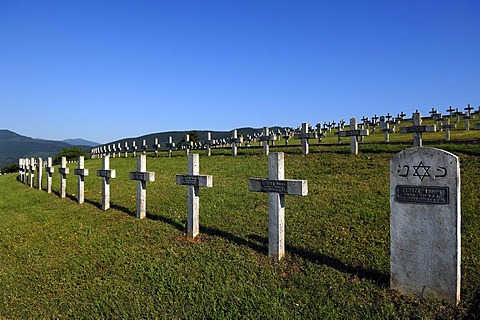 Crosses with names of soldiers of Jewish origin in the military cemetery on Blutberg hill, in the back the the Vosges mountains, Sigolsheim, Alsace, France, Europe