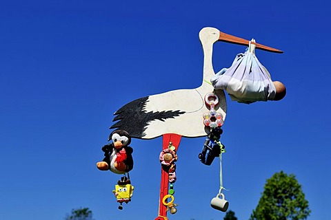 Stork showing the birth of a child, local custom, Reit im Winkl, Bavaria, Germany, Europe