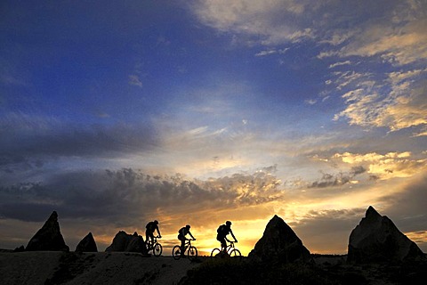 Mountain bikers cycling in Goereme, Cappadocia, Turkey