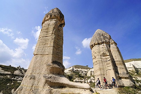 Mountain bikers in Love Valley, Guevercinlik Valley, Goereme, Cappadocia, Turkey