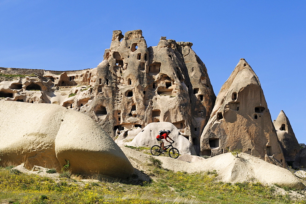 Mountain bikers in the Rose Valley, Uchisar, Goereme Valley, Cappadocia, Turkey, Western Asia