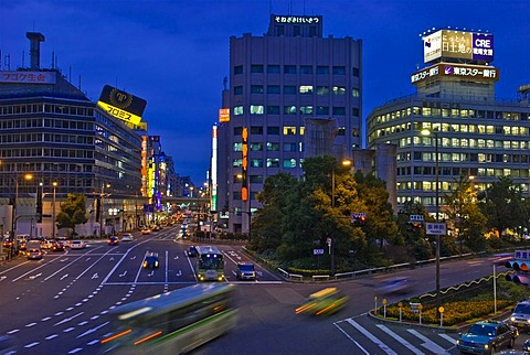 Neon lights and traffic blur at dusk, Umeda, Osaka, Japan, Asia