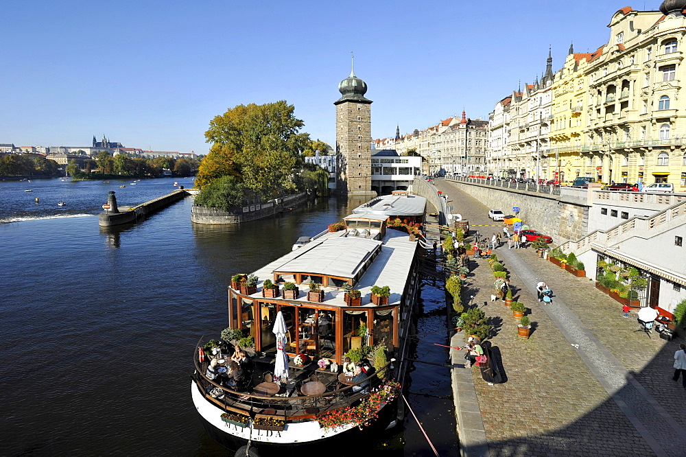 Vltava river, restaurant and hotel boat, old water tower, Slavonic Island, Masaryk-Kai, Prague, Bohemia, Czech Republic, Europe