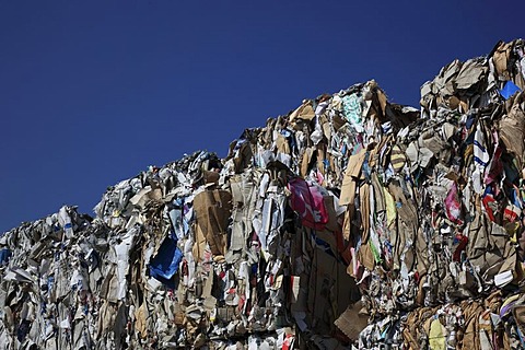 Used paper, stacks of used paper at a recycling yard, paper recycling