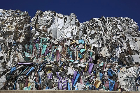 Used paper, stacks of used paper at a recycling yard, paper recycling