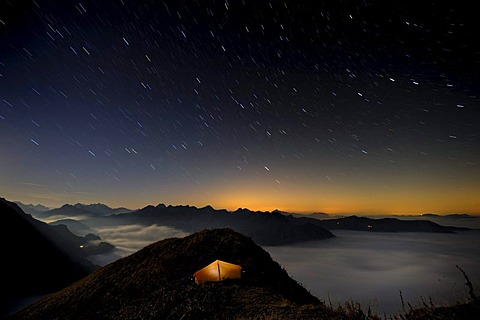 Tent on a peak af the blue hour, Allgaeu Alps, Kleinwalsertal valley, Vorarlberg, Austria, Europe