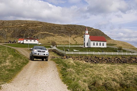 Off-road vehicle, Helgafell church near Stykkisholmur, Snaefellsnes Peninsula, Iceland, Europe