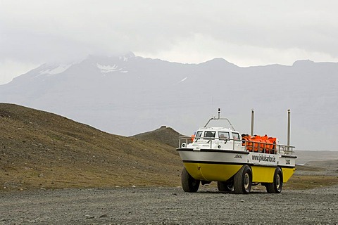 Amphibious vehicle in Jokulsarlon glacial lagoon, South coast, Iceland, Europe