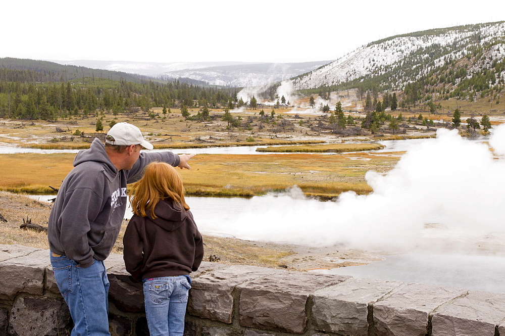 Tourists at Firehole River, Yellowstone National Park, Wyoming, USA