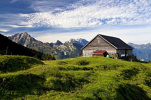 Hiking weather in late summer with a view overlooking the alm, alpine pasture, in Arvenbuehl towards Glaernisch Mountain, Canton of Glarus, Switzerland, Europe