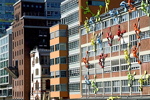 Varied colourful architecture with the Flossies installation by Rosalie in the foreground, Medienhafen media harbour, Duesseldorf, North Rhine-Westphalia, Germany, Europe