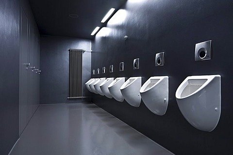 Urinals mounted in a row, modern, men's lavatory, bathroom, toilet, Germany, Europe