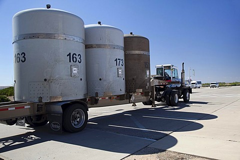 TRUPACT shipping containers used to transport radioactive waste are moved at the Waste Isolation Pilot Plant; nuclear waste from America's nuclear weapons program is shipped by truck from all over the country to be stored in rooms carved out of an ancient