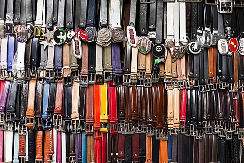 Leather belts at a market in Florence, Tuscany, Italy, Europe