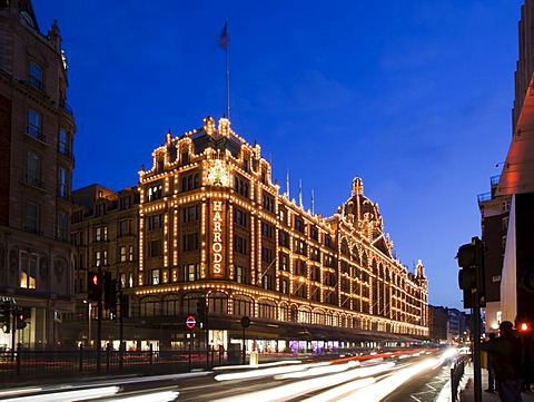 Harrods Department Store at dusk with traffic trails, Knightsbridge, London, England, United Kingdom, Europe