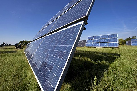 Solar panels mounted on so called Movers, moving in circles around their axes with the movement of the sun, Gut Erlasee Solar Park, Arnstein, Bavaria, Germany, Europe