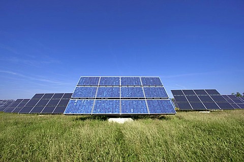 Solar panels mounted on so called Movers, moving in circles around their axes with the movement of the sun, Gut Erlasee Solar Park, Arnstein, Bavaria, Germany, Europe