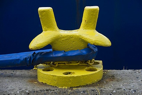 Mooring rope around yellow bollard, port of Hvide Sande, Denmark, Europe