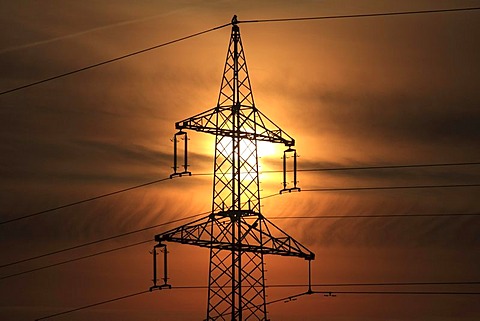 Electricity pylon at sunrise