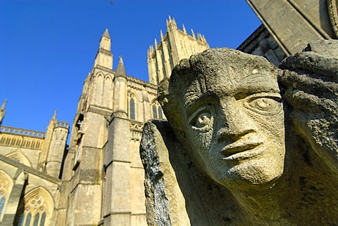 Stone face on Wells Cathedral, Wells, Somerset, England, United Kingdom, Europe