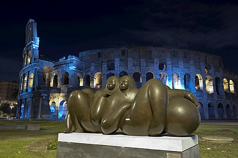 Modern bronze sculpture, "Pareja", by Jimenez Deredia, 2009, Piazza del Colosseo, by night, as part of the temporary exhibition "La ruta de la paz", by night, Rome, Italy, Europe