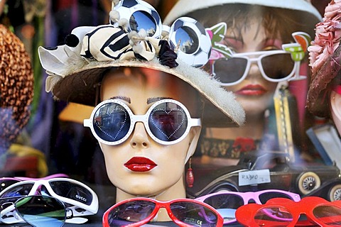 Crazy sunglasses in a shop window, Calle Defensa Street, historical district and tourist quarter of San Telmo, Buenos Aires, Argentina, South America