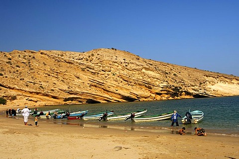 Motorboats on Quantab beach in the picturesque Barr Al Jissah bay, Gulf of Oman near Muscat, Sultanate of Oman, Middle East