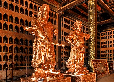 Restored statues on the construction site of the Chua Bai Dinh pagoda, one of the largest pagodas in Southeast Asia, near Ninh Binh, Vietnam, Southeast Asia