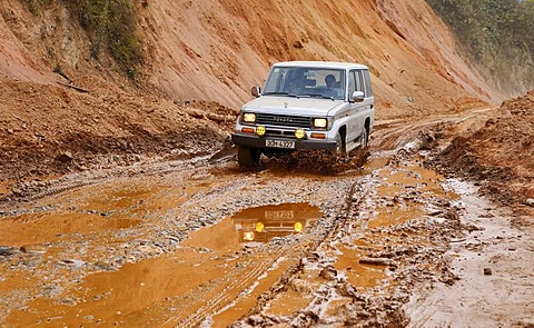 Jeep driving through the Mai Chau Valley, Vietnam, Asia