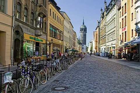 Coswiner Strasse Street and Schlosskirche Church, Lutherstadt Wittenberg, Saxony-Anhalt, Germany, Europe