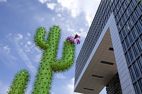 A metal cactus standing next to a Kranhaus building, Rheinau port, Cologne, North Rhine-Westphalia, Germany, Europe