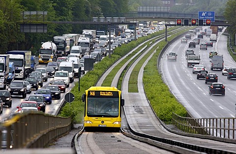 Traffic jam on the A40 motorway or Ruhrschnellweg, in front of a long-term construction site between Essen and Gelsenkirchen, bus lane with a guided bus on the central lane, North Rhine-Westphalia, Germany, Europe