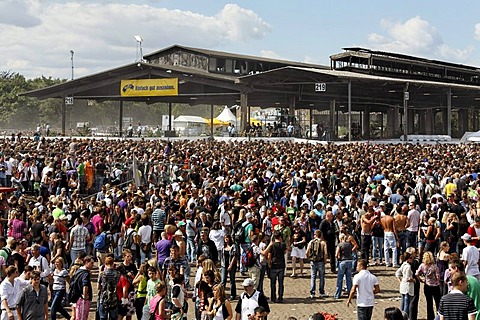 Crowds outside the derelict buildings of an old freight depot, Loveparade 2010, Duisburg, North Rhine-Westfalia, Germany, Europe